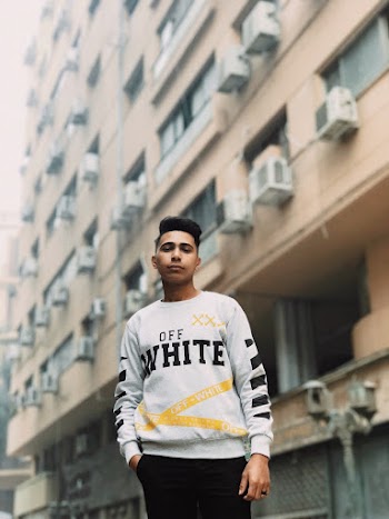 Photo of Man Wearing White Sweater