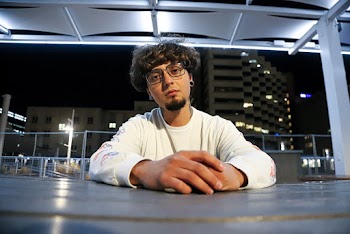 Photo Of Man Wearing White Sweater