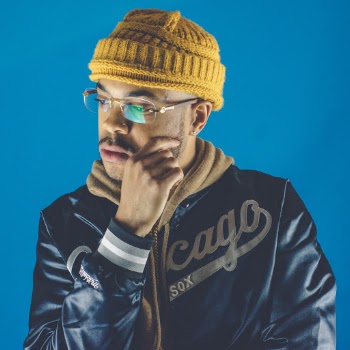 Photo of Man Wearing Yellow Bonnet