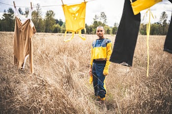Photo Of Man Wearing Yellow Jacket