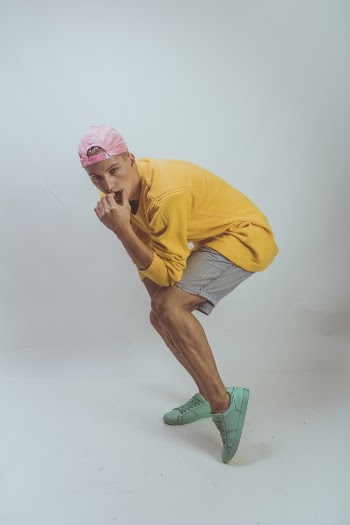 Photo of Man Wearing Yellow Sweater