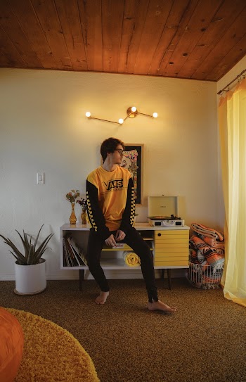 Photo Of Man Wearing Yellow Sweater