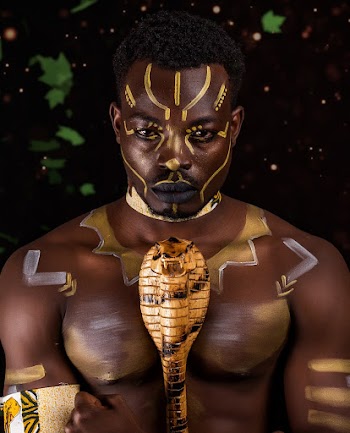Photo of Man With Face and Body Paint