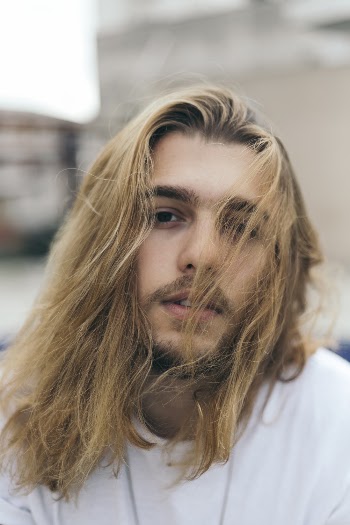 Photo of Man With Long Hair