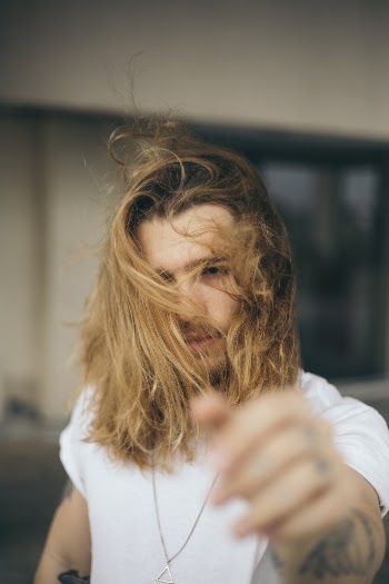 Photo of Man With Long Hair