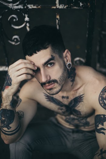 Photo of Man With Tattoos