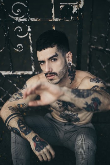 Photo of Man With Tattoos