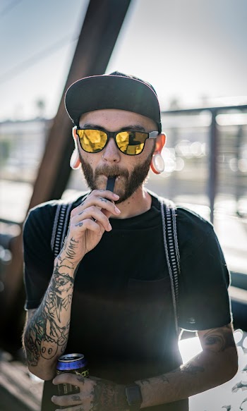 Photo Of Man With Tunnel Earrings 