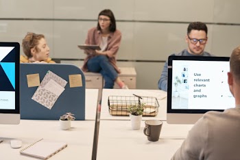 Photo Of Men Near Computers