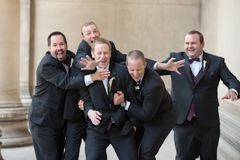 Photo of Men Posing For Camera