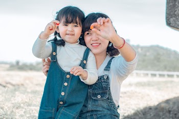 Photo of Mother Playing With Her Daughter