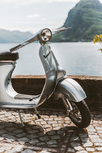 Photo of Motorcycle Parked On Pavement