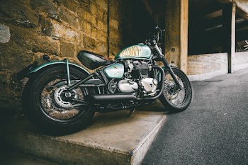 Photo of Motorcycle Parked On Pavement