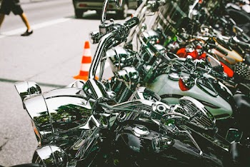 Photo of Motorcycles Parked on Street