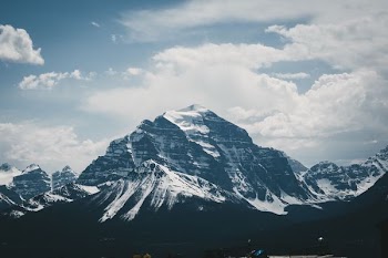 photo of mountain filled with white snow
