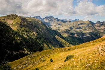 Photo of Mountain Range Under Cloudy Sky