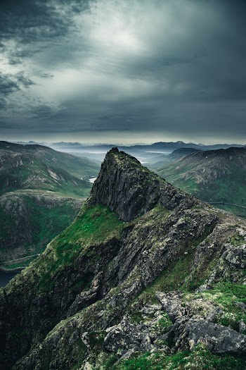 Photo of Mountain Scenery Under Cloudy Sky