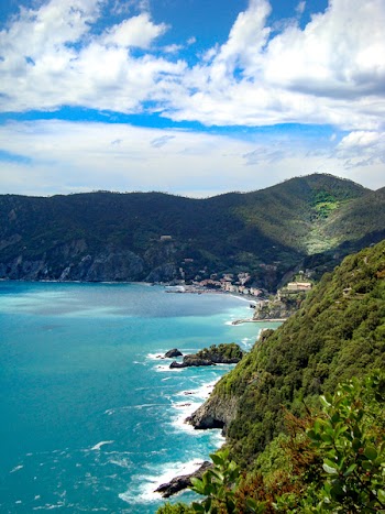 Photo of Mountains Beside Body Of Water