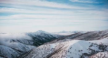photo of mountains filled with snow