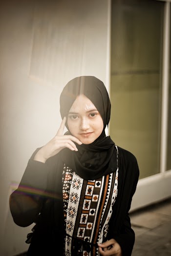 Photo of Muslim Woman in Black Hijab Posing
