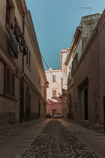 Photo of Narrow Alley In Between Buildings