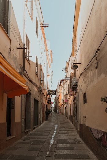 Photo of Narrow Alley In Between Buildings