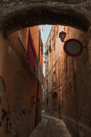 Photo of Narrow Alley In Between Buildings