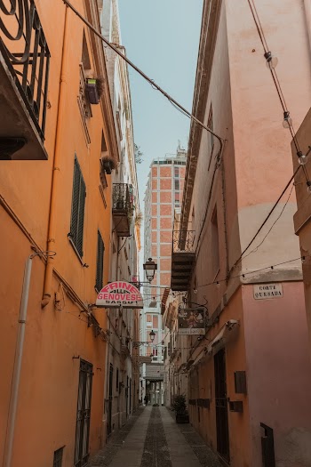 Photo of Narrow Alley In Between Buildings