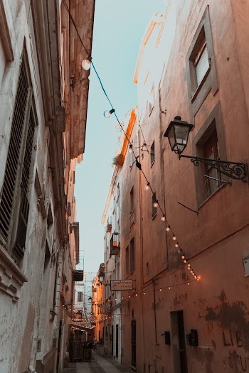 Photo of Narrow Alley In Between Buildings