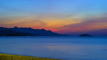 Photo of Ocean Apart from Mountain