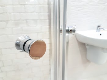 Photo of Opened Door of Bathroom