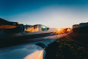 Photo of Parked Airplane on Ground