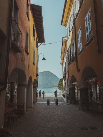 Photo Of Paved Pathway Between Buildings