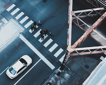 Photo of People Crossing The Road