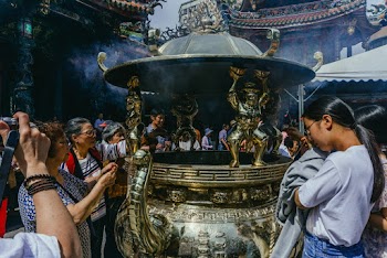 Photo of People Doing Rituals