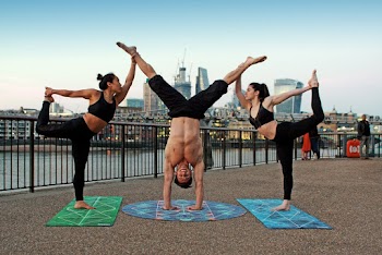 Photo of People Doing Yoga
