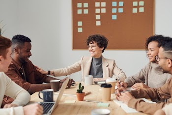Photo Of People Having Conversation