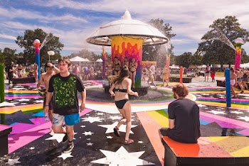 Photo of People Having Fun in Water Park