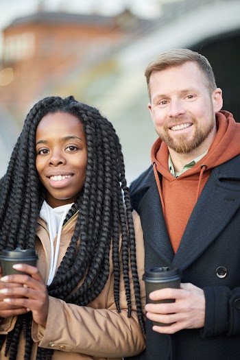Photo Of People Holding Coffee Cups