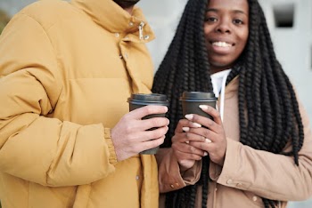 Photo Of People Holding Coffee Cups