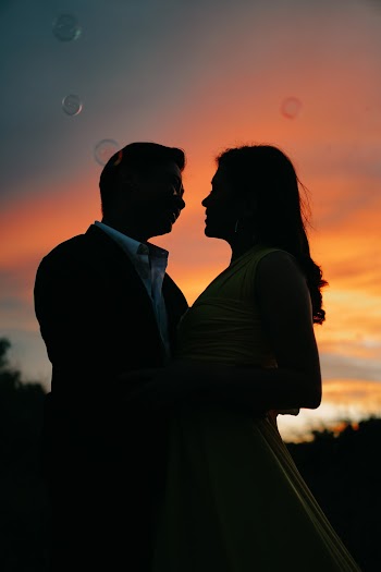Photo Of People Hugging Each Other During Dawn
