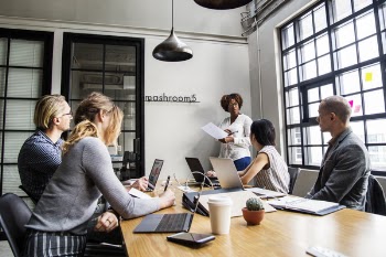 Photo of People in a Meeting