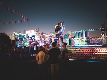 Photo of People in Amusement Park