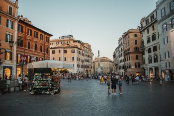 Photo of People Near Buildings