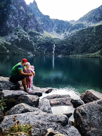 Photo Of People Near Water