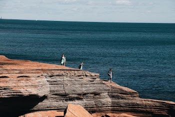 Photo of People on Cliff
