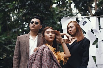 Photo Of People Posing For Camera