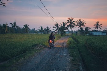Photo of People Riding Motorcycle