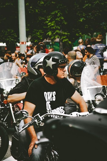 Photo of People Riding Motorcycle