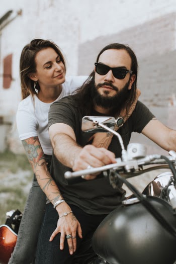 Photo of People Riding Motorcycle